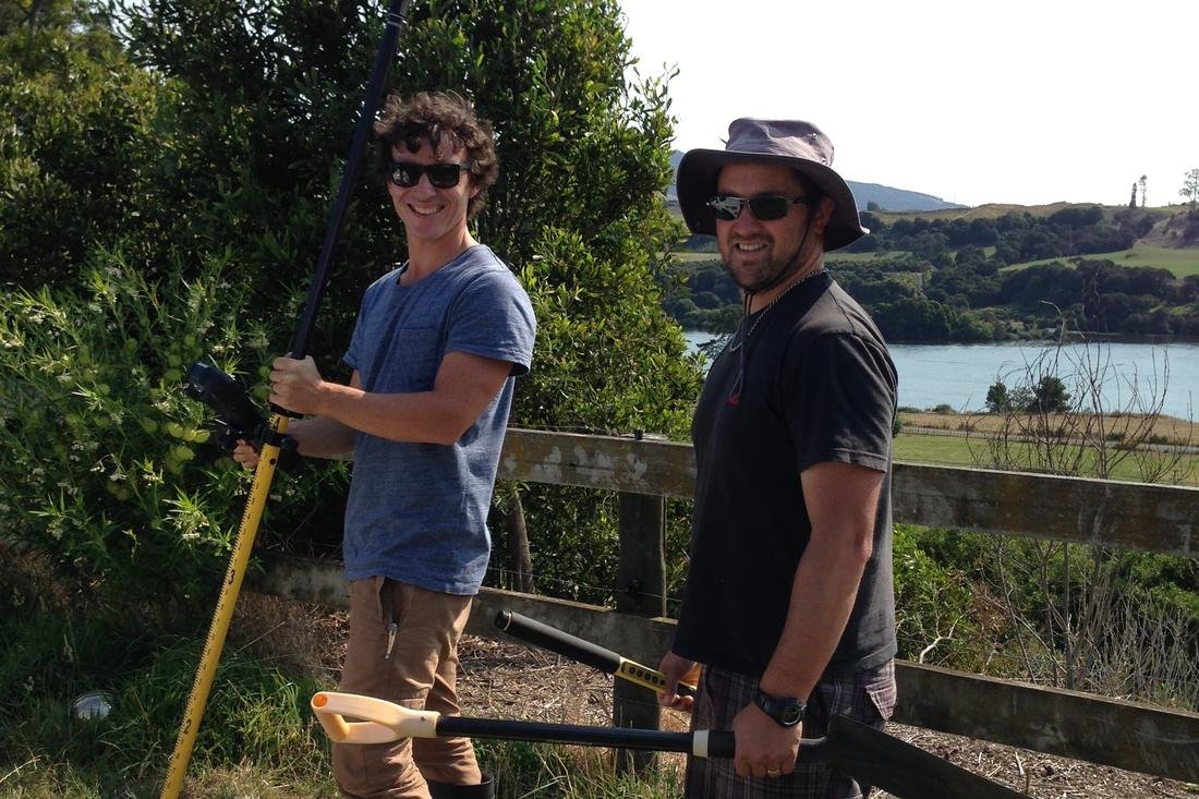 Two GeoSurvey surveyors on a coastal boundary job